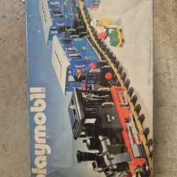 Vintage Playmobil Set No. 4000 Electric Passenger Train in very nice condition, complete with original box and accessories.