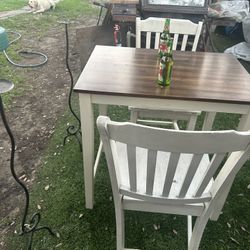 Table With 2 Chairs And Two Candle Holders 