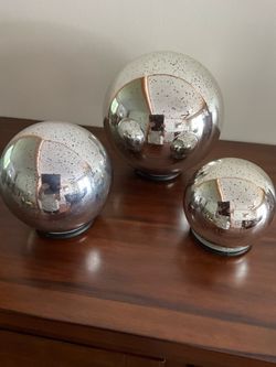 Any set of timer spheres, glass timer candles, lamps/ Choice