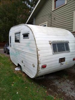 1957 Mercury canned ham trailer