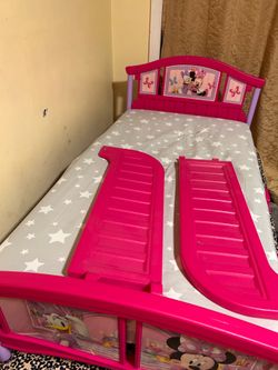 Minnie Mouse toddler pink bed and crib mattress with fitted sheet