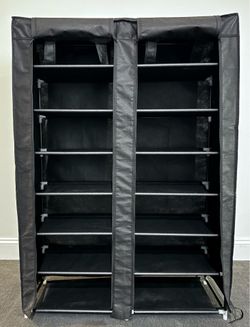 Moving out sale. Shows rack (28 pair)
