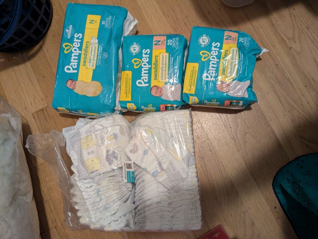 Approx 140 Newborn Diapers