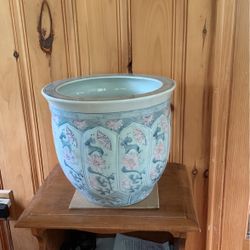 A Ceramic Pot13” Tall And 13” Wide