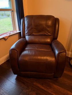 Leather Chair  100.00