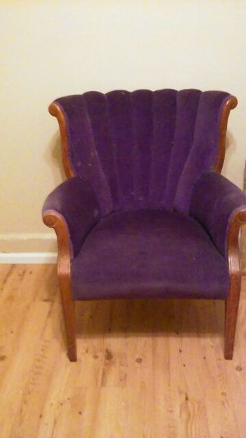 Hey nice purple wingback chair $