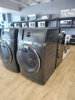 $1300(LIMITED TIME OFFER: FREE DELIVERY Within 20 Miles) GE Profile Electric All-In-One Washer/Dryer