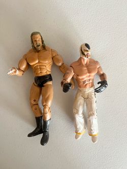 WWE REY MYSTERIO TRIPLE H