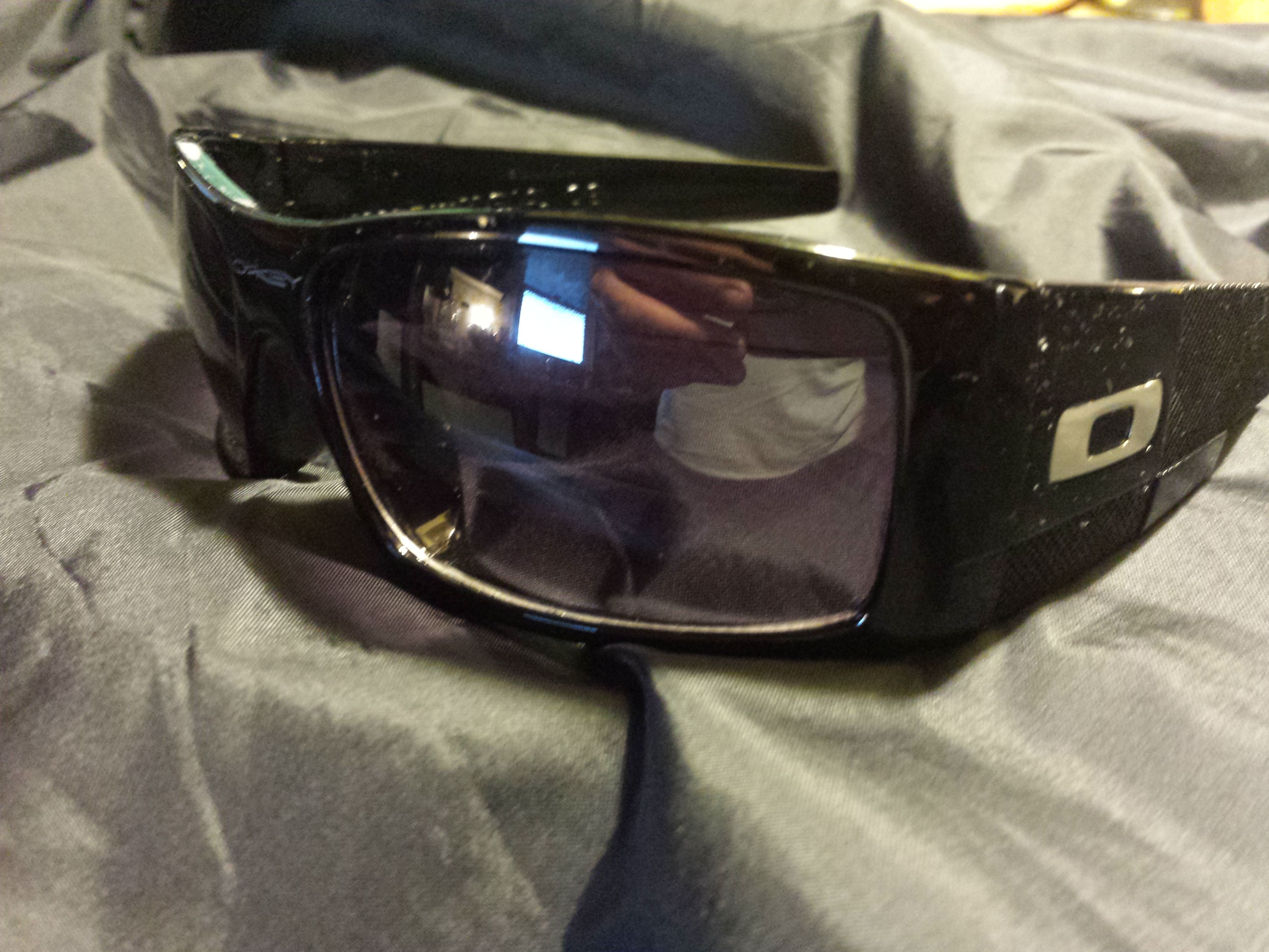 Oakley Rail sunglasses BD5969 black with black plutonite gradient lenses.
