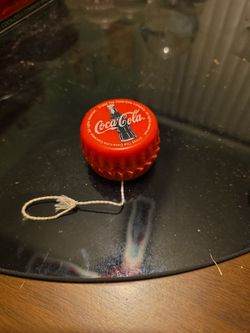 a 1998 Coca-Cola Bottle Cap Yo-Yo