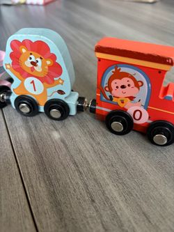 Wooden animal magnet train