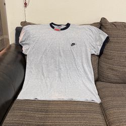 Size Large. New Nikes T-shirt.