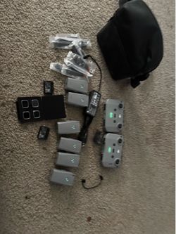 DJI mavic air2s (six batteries with multi charger, two controllers, two bags and extra propellers and lenses