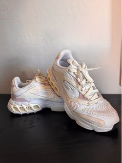 Pink and White Women’s Nike Shoes