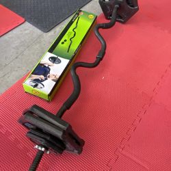 1inch curl bar with 50lb in plates $70