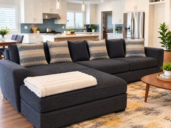 Large Dark Blue Sectional Sofa with Chaise and Accent Pillows