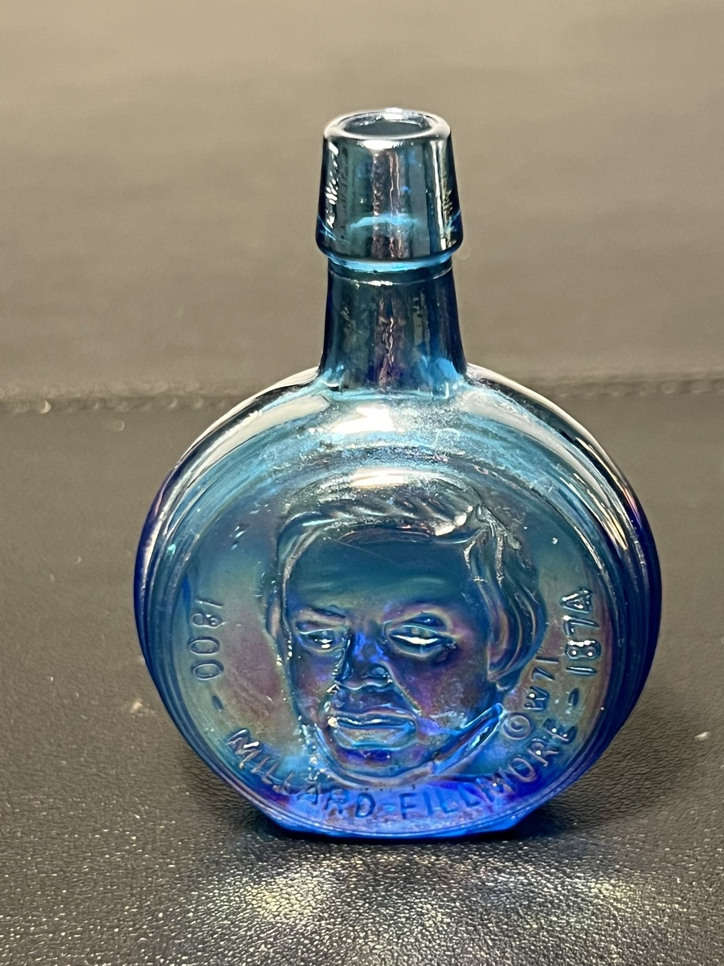 Wheaton 1970s Presidential Series Millard Fillmore Blue Iridescent Bottle, 3.25”