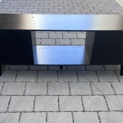 Amazing TV stand with drawers. it’s 55 inches wide.