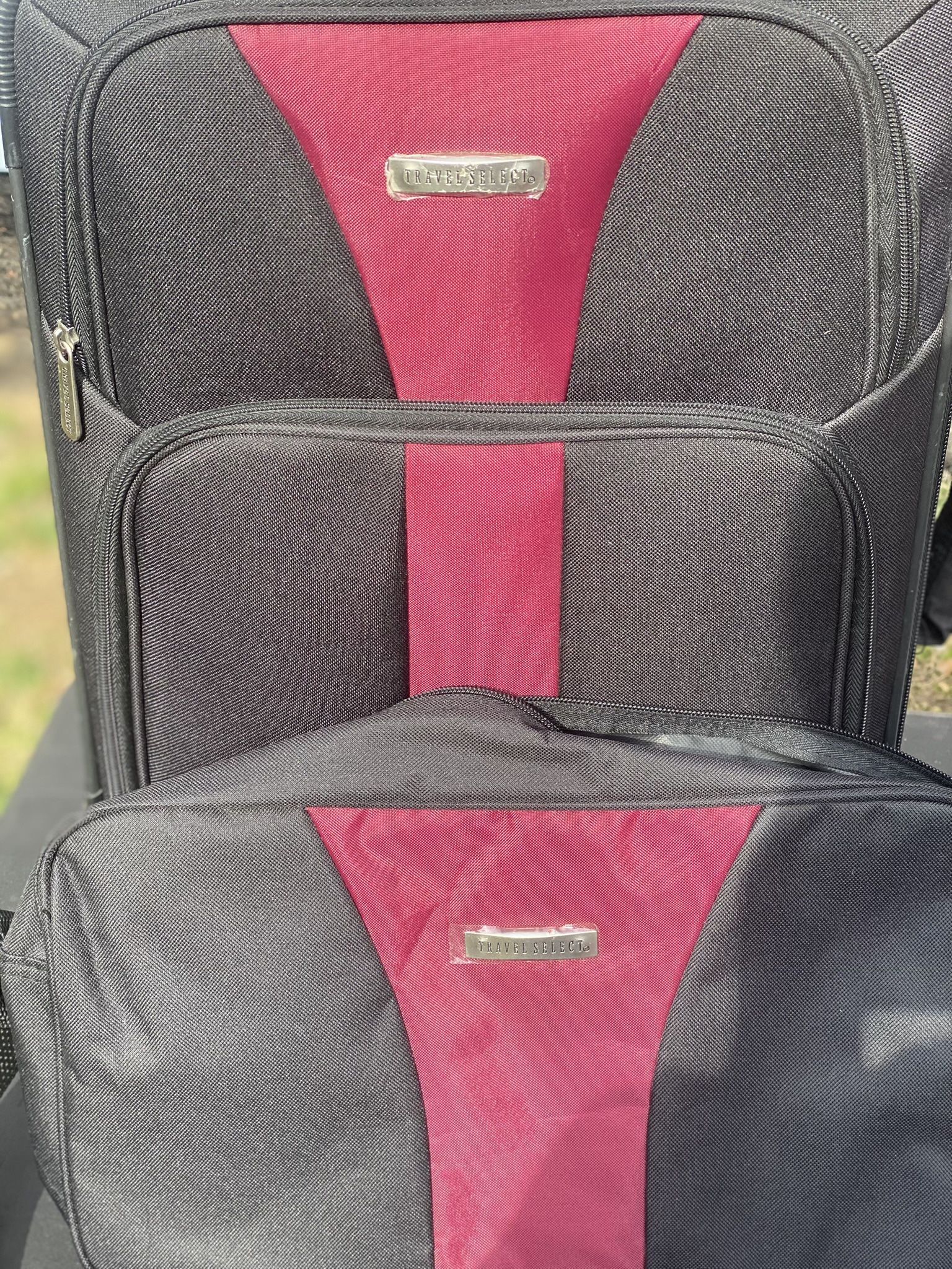 Travel Select" soft-shell luggage pieces, possibly "Borderline" brand, stacked together. 2 piece