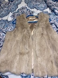 Fur vest only wore it once ( paid $200 for it)
