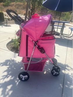 Pet stroller its hot pink not baby pink