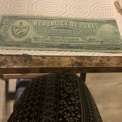 The image displays a vintage Cuban government's warranty seal for cigars exported from Havana. This seal, featuring the Cuban coat of arms and text in