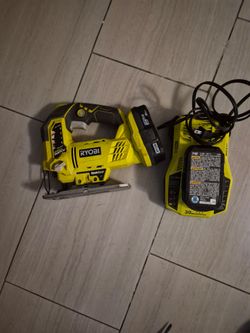 Ryobi jig saw with battery and charger