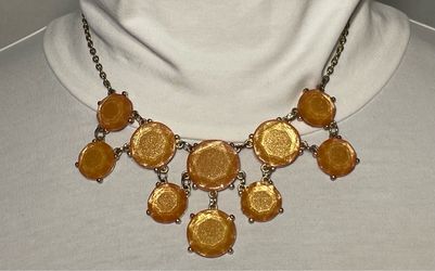 Peach colored necklace