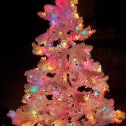 6.5 foot pre-lit Madison Pine Christmas tree with topper and additional decorationsk740p