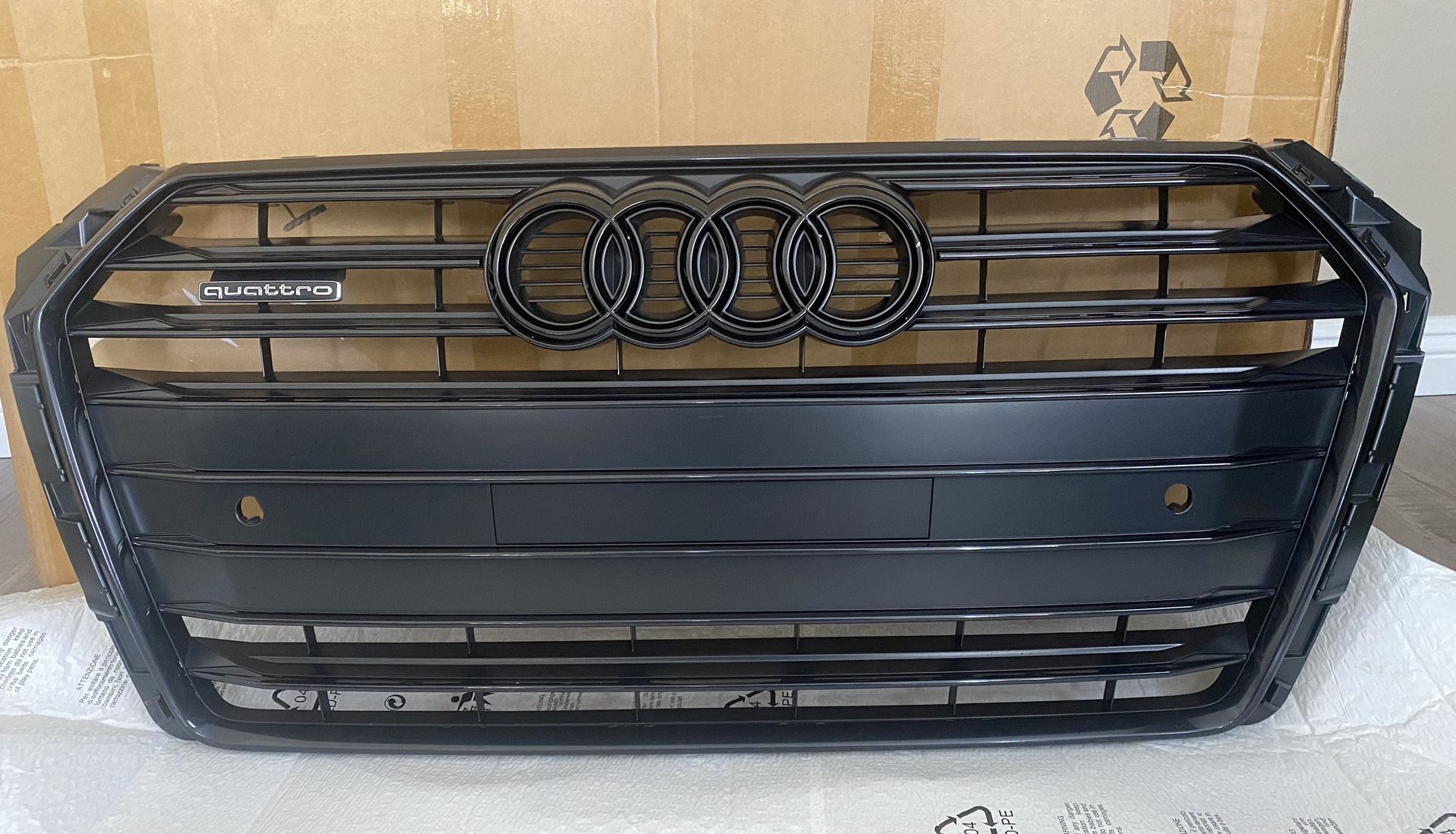 2018 A4 B9 S-Line Black Optics Package Front Bumper Grill Assembly With License Plate Delete, Black Front Emblem, And The License Plate Bracket