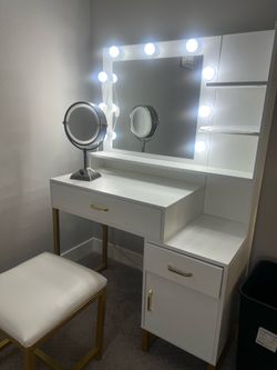 Vanity table with lights and mirror