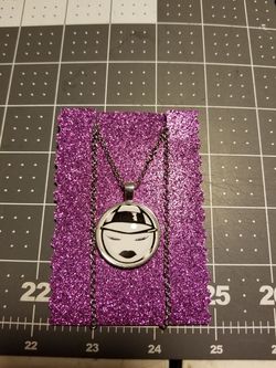 Lowrider girl necklace.