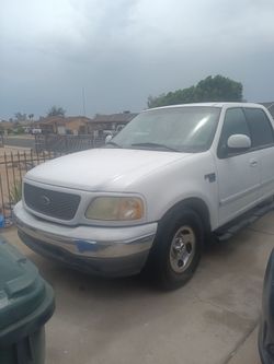 2003 Ford F150 Triton v8 , 4door