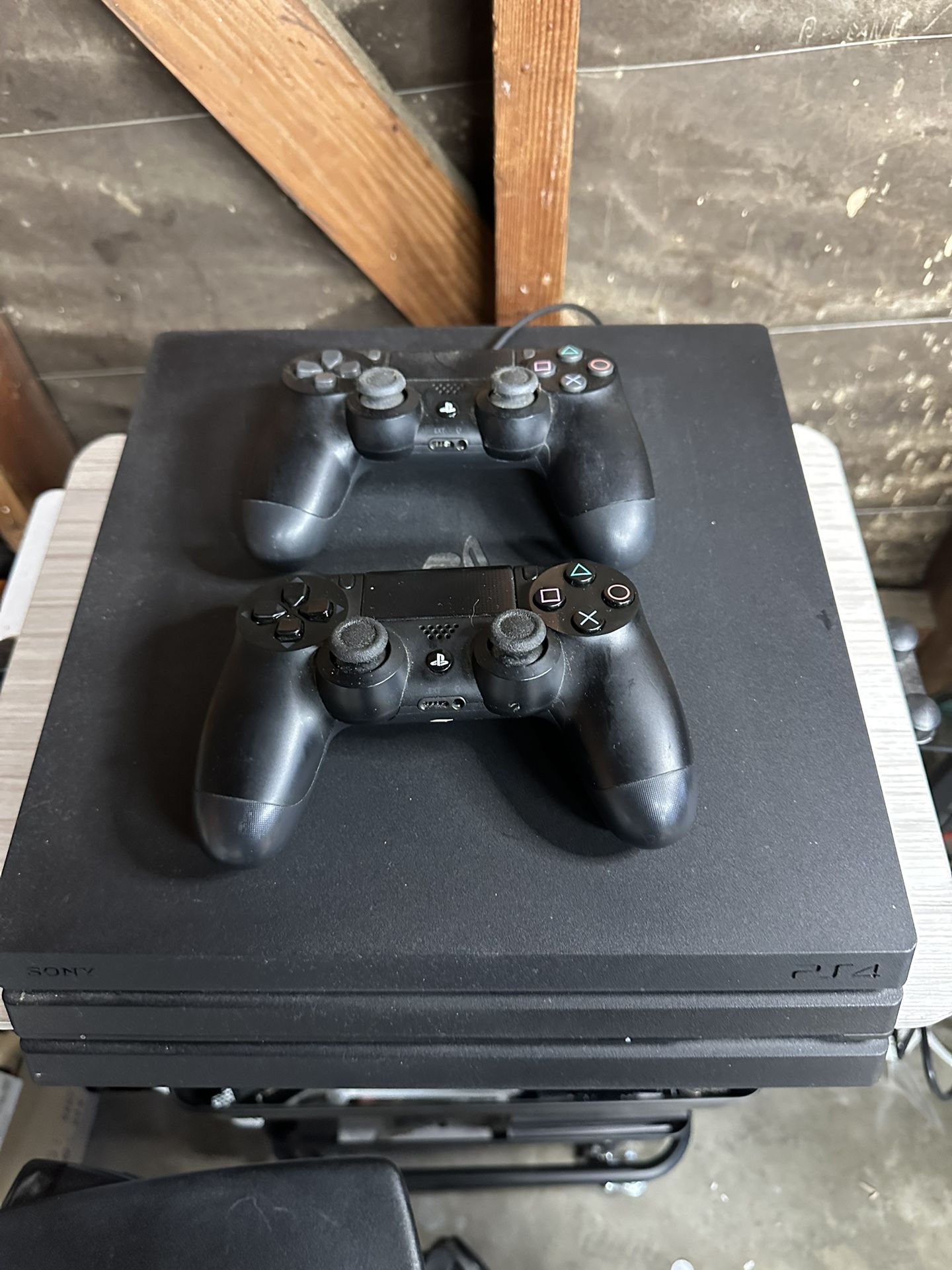 Used PlayStation 4 Pro 1TB With 2 Controllers + Games (Selling As A Bundle)