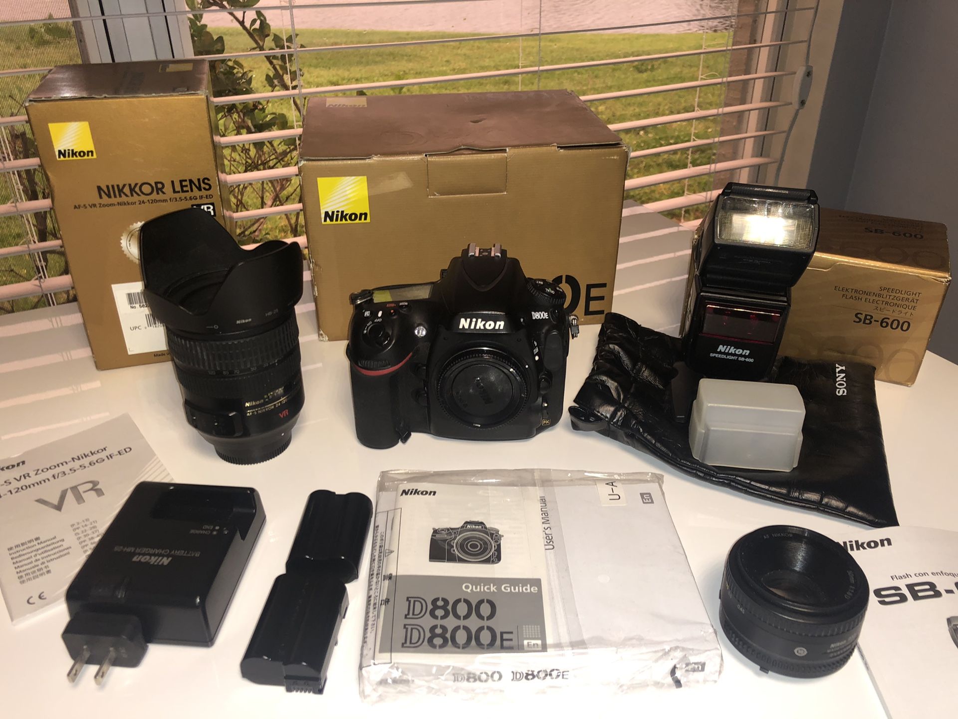 Whole package of the (camera is sold), lens, batteries, and flash