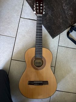 Hohner acoustic classical 1/2 size guitar