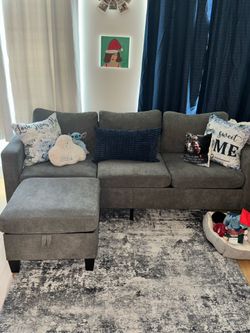3 seat sofa with ottoman in grey color