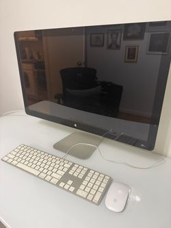 Older Apple monitor, with Apple keyboard, and Apple Wireless mouse