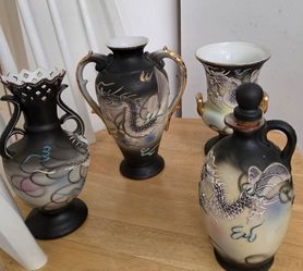 4‑piece Vintage Japanese Dragonware lot. 3 vases + 1 decanter bottle, approx 7” tall. Moriage raised dragon detail. All excellent condition, no chips,