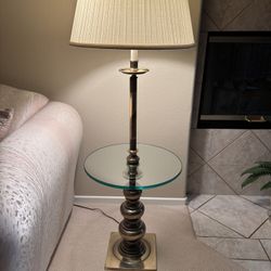 Antique brass lamp with attached table