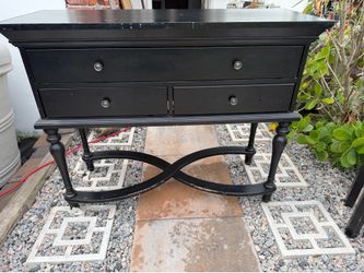 Three three-piece black furniture set