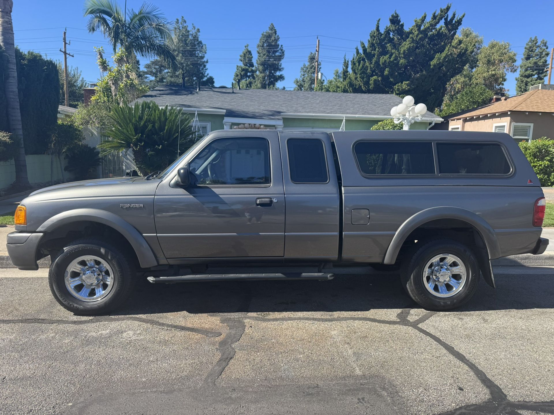 2004 ford ranger XLT automatic 4.0 V6 cold ac power windows power lock tilt cruise am/fm/cd rear seats keyless entry and alarm side steps new tires be