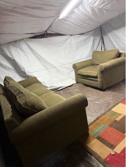 Couch with matching chair the couch has a pullout bed good condition clean we sell all the time delivery $40 local