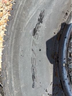 These are Cooper Pathfinder HT tires. The size is 235/75R15. They're ready for your vehicle!