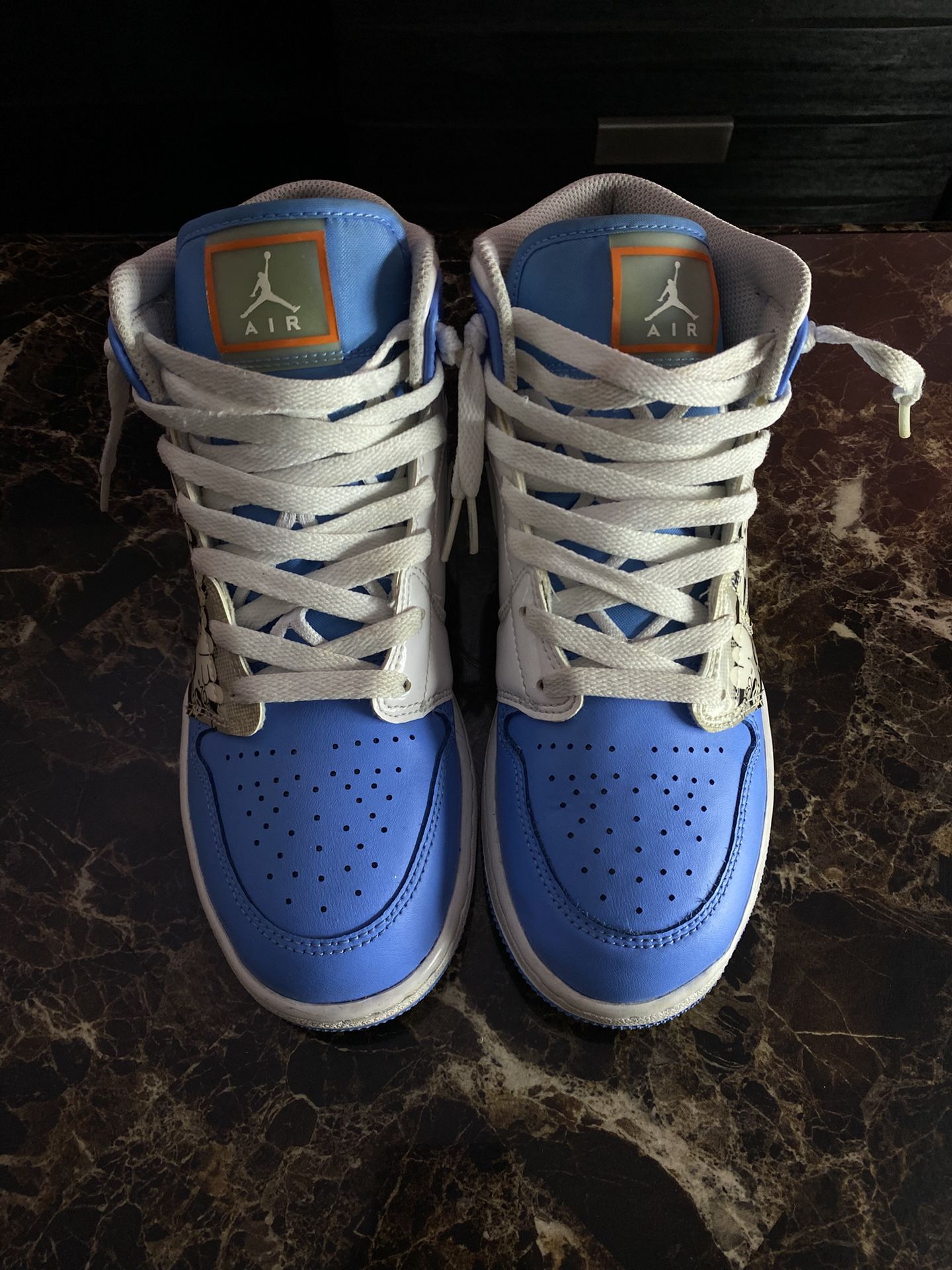 Air Jordan 1 Mid “UNC Graffiti”