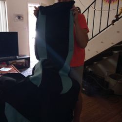 Air Bag  Seat Covers Front Buckets ,Two And Full Back Seat Top And Bottom Covers. And Four Headrests. Never Been Used . Black With Aqua Stripe ,Clean 