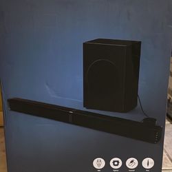 Surround Sound System brand new, includes subwoofer, soundbar that can be set up vertical
