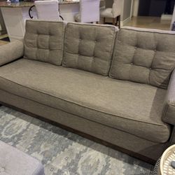Tan Couch With Tufted Back