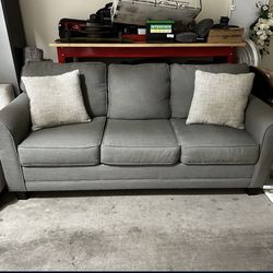 Grey Couch w/ Pillows Included