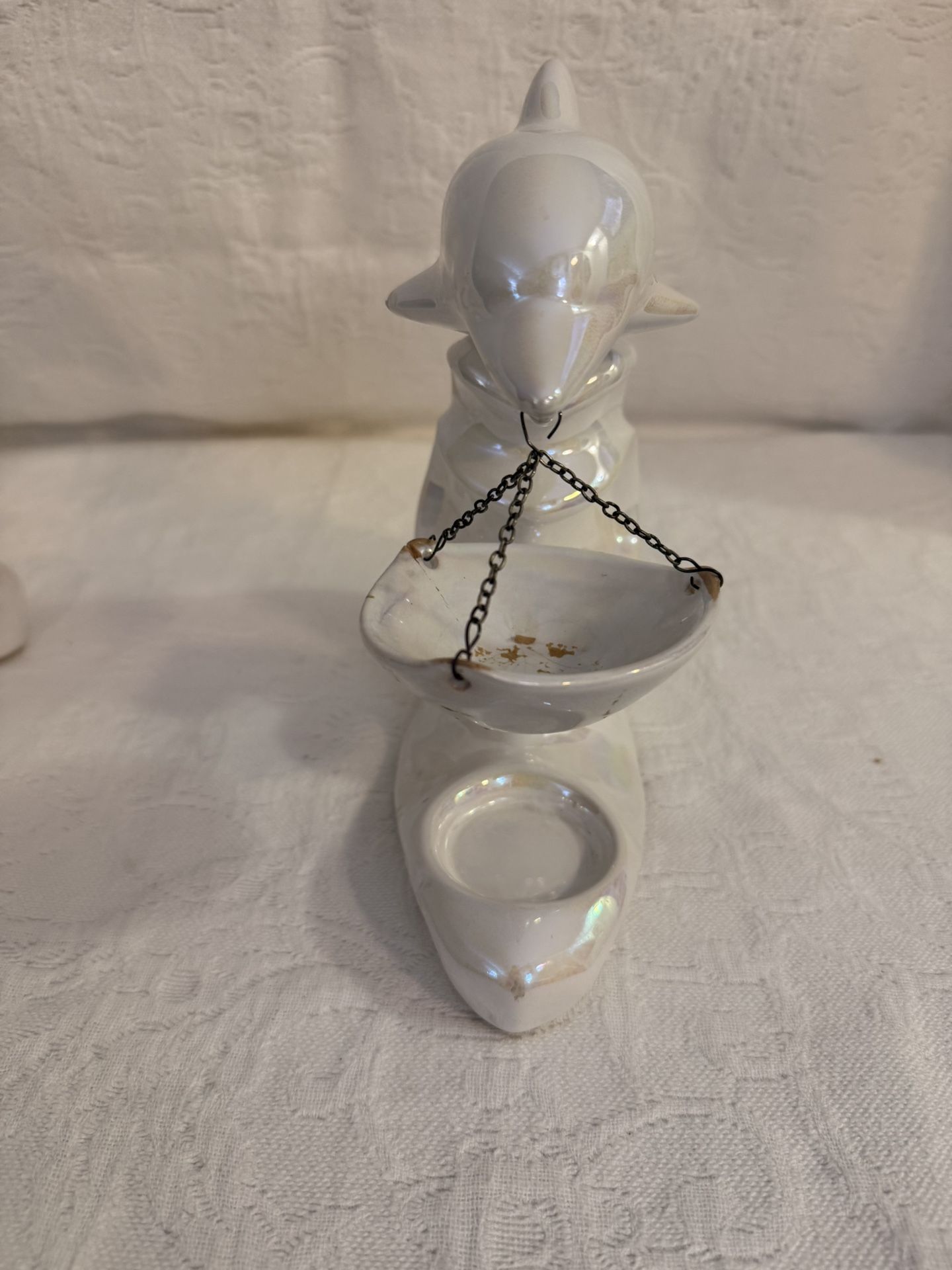 White iridescent porcelain dolfin oil wax warmer candle holder by Marex. Made in Poland